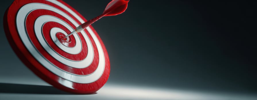 The dart hitting the target symbolizes precision and success in achieving goals. photo
