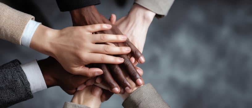 The Hands of Unity Symbolizing Collaboration and Teamwork in a Professional Setting photo