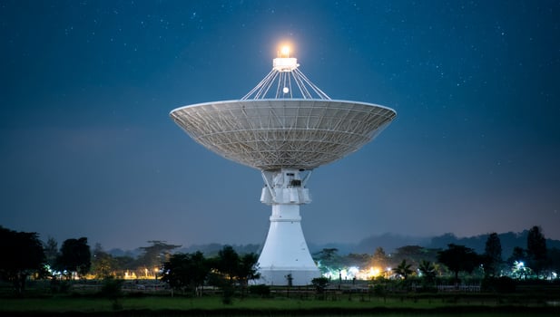 Majestic telescope under starlit skies glows, connecting space with ground photo