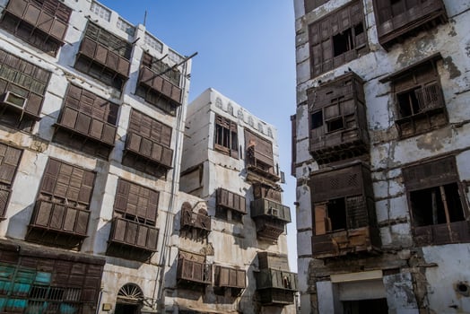 The colorful vintage wooden windows and doors, a popular touristic landmark in historic Jeddah, Saudi Arabia, a beautiful architecture style. photo