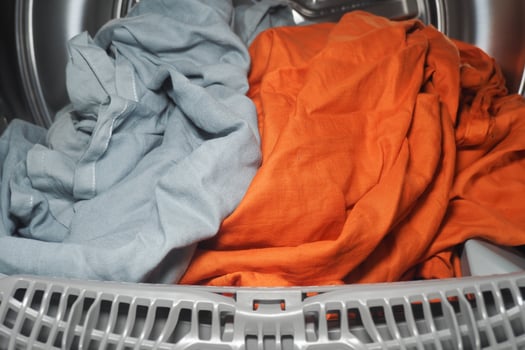 Clothes drying in a modern laundry machine photo