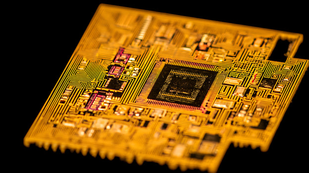 Macro View of Golden Circuit Board Lines and Components. photo