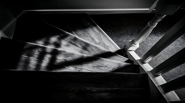 Dramatic Shadows Dance on Rustic Wooden Stairs with White Banister. photo