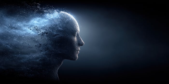Head profile dissipating with particles. Represents mental health, memories photo
