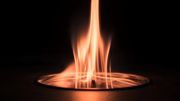 Mesmerizing Orange Flames Dance in the Darkness with Elegant Light Trails. photo