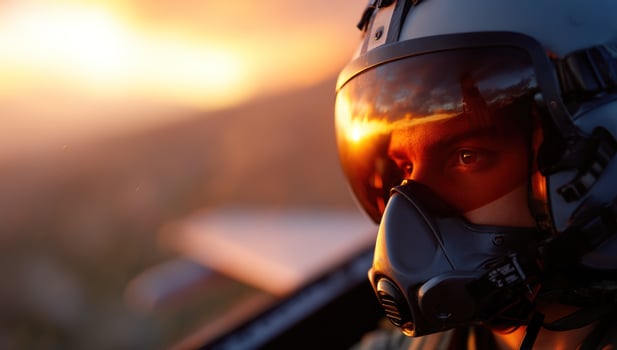 Pilot in cockpit, sunset. Aviation, aerospace concept, career, dream in background photo