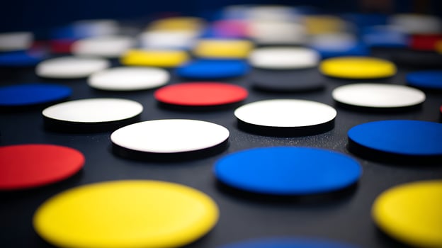 Colorful Round Shapes on a Dark Surface in Soft Focus. photo