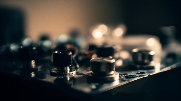 Detailed Close up of Vintage Electronic Control Knobs. photo
