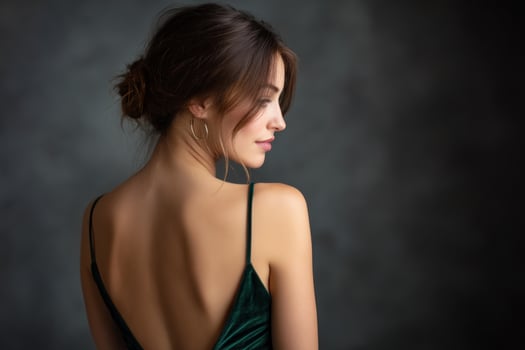 Young Woman Posing in Studio, Showing off Elegant Dress, for Beauty or Fashion Use photo