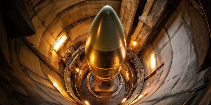 Inside silo, a large missile stands ready, waiting for launch. Secure location photo