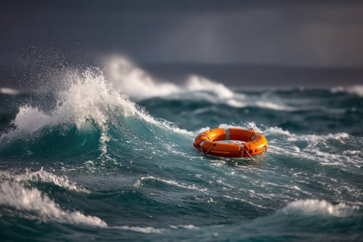 Lifebuoy floats adrift on ocean waves during stormy weather in dark blue sea photo