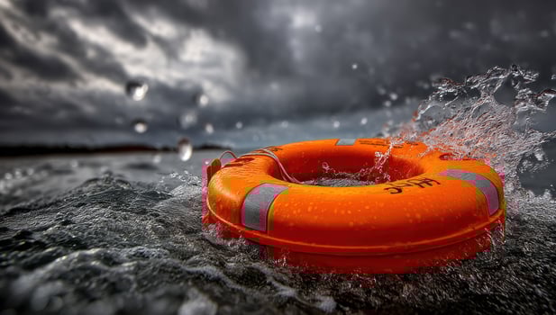 Lifebuoy on water splashing with dark clouds in the background for safety posters photo