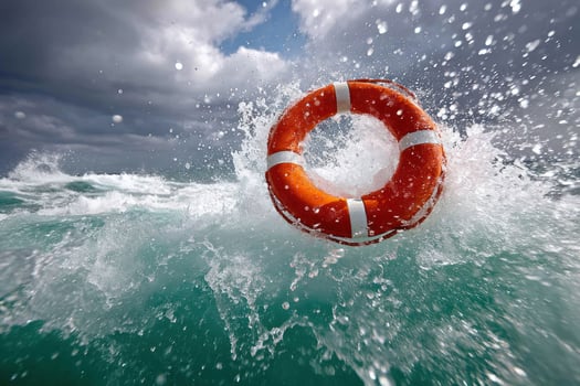 Life ring soaring through splashing ocean waves against cloudy, blue sky background photo