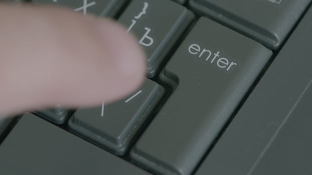 An UpClose Look at Keyboard Interaction Featuring the Enter Key in Detail and Action photo