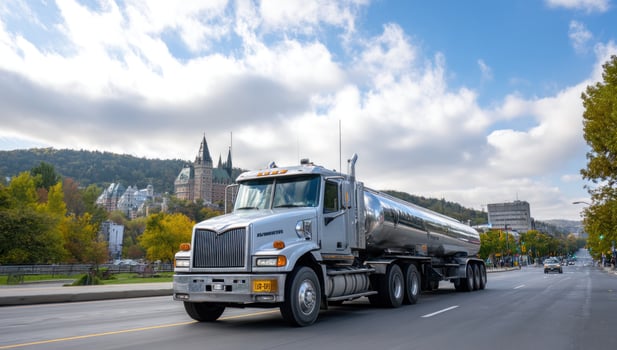 Tanker truck transports fuel in Quebec city. Castle behind. For transportation use photo