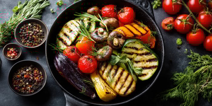 Grilled vegetables cooking with herbs and spices for a healthy vegan diet photo