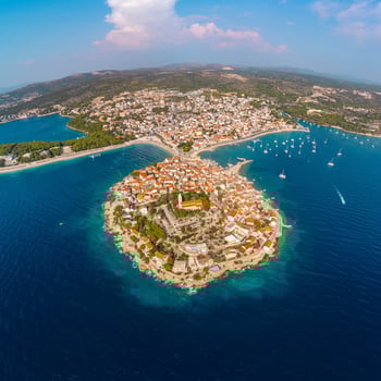 Panorama of the tourist town of Primosten in Croatia. A summer tourist attraction in this coastal town on the Adriatic Sea photo