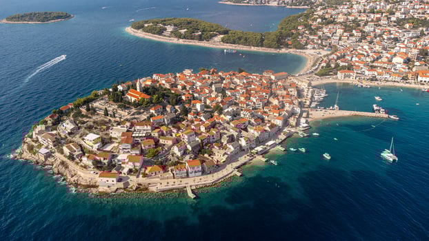 Tourist town of Primosten in Croatia. A summer tourist attraction in this coastal town on the Adriatic Sea photo