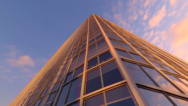 Modern skyscraper facade at sunset photo