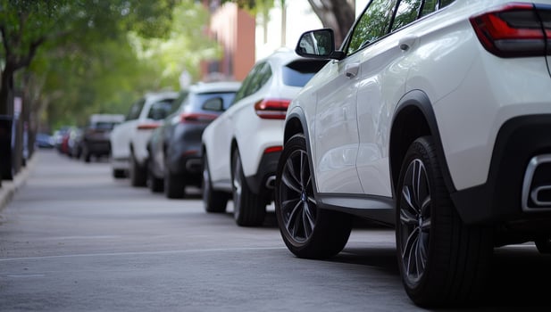 Parked cars on city street photo