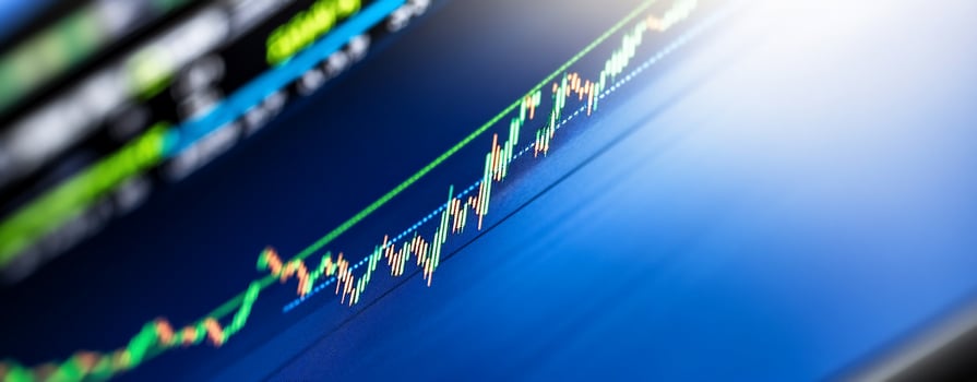 Financial stock market graph showing upward trend on digital display photo