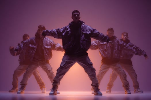 A group of men dancing in front of a purple light photo