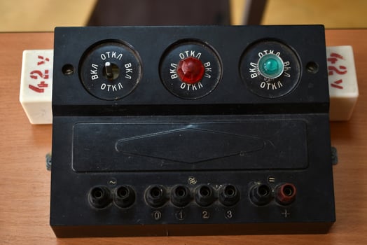 The school's power supply system. Electronic control panel with buttons and toggle switches. The old management system for training. photo