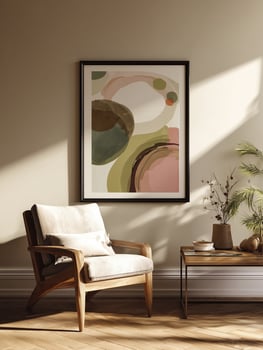 Cozy corner with modern armchair, abstract art print, and natural sunlight creating warm ambiance in stylish living space photo