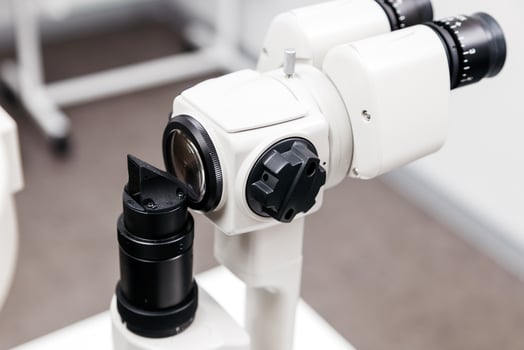 Ophthalmology equipment close-up showcasing advanced vision testing technology with detailed optics and precision mechanics for eye examinations photo