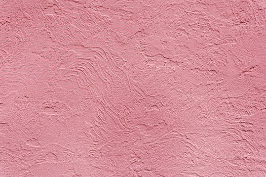 Beautiful uneven pink texture. Neutral decorative background. photo