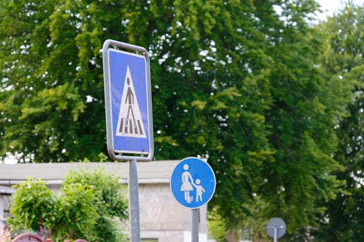 Blue pedestrian sign with children pedestrian zone marker photo
