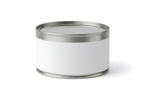 A white tin can with a blank label on it photo