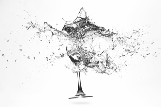 Explosion of a glass with water photo