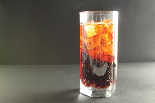 kvass in an iced glass on a gray background with room to text a cold refreshing summer drink photo