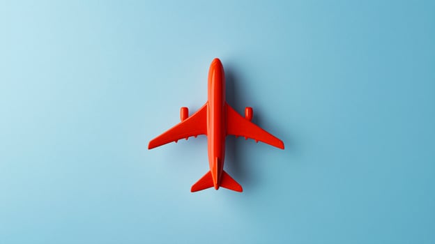 An airplane is shown in the air on a blue background photo