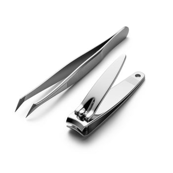 A pair of tweezers and a pair of scissors photo