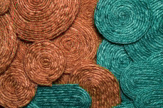 Clear texture of red and green panorama. Abstract fabric texture or pattern, close-up of green and orange thread, macro shot of textile surface, wallpaper template for banner photo