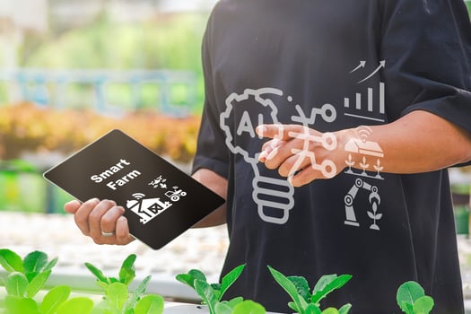 Agricultural technology concept, Ai system. A young man is working on a farm using a tablet controller with innovative technology for a smart farm system. photo