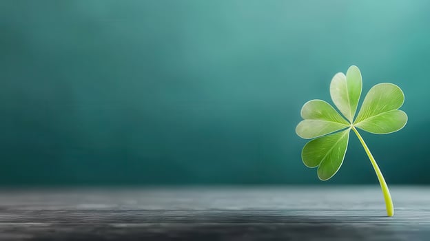 Close up of four leaf clover on wooden table symbolizing luck and hope photo