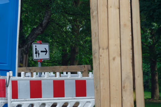 Construction Barrier and Pedestrian Detour Sign on Sidewalk photo