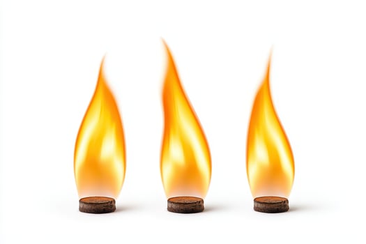 Cluster of three flames in triangular formation isolated on white background with bright orange and yellow colors photo