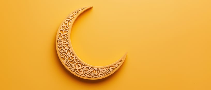 Ornamental crescent moon with intricate design yellow background photo