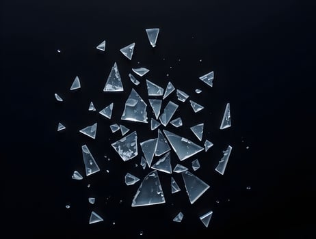 Broken glass on a black background photo