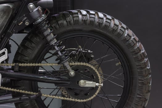 A motorcycle with a chain attached to it photo