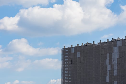 A large building with a clock on top of it photo