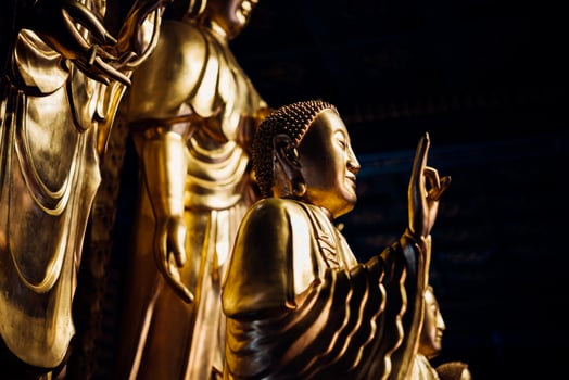 Golden buddha statue in the temple of buddhism in beijing, china photo