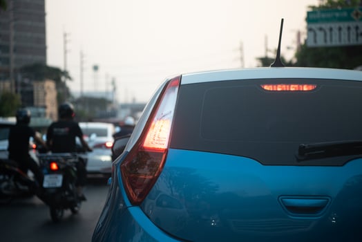 A blue car with red lights photo