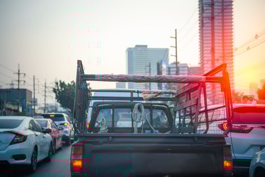 A truck with a dog in the back photo