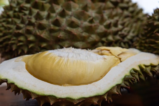 A durian fruit with a hole in it photo