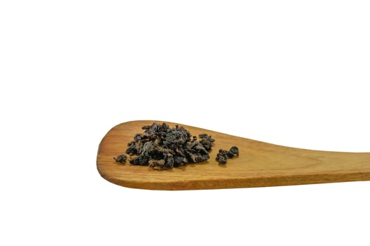 Tea on wooden spoon photo